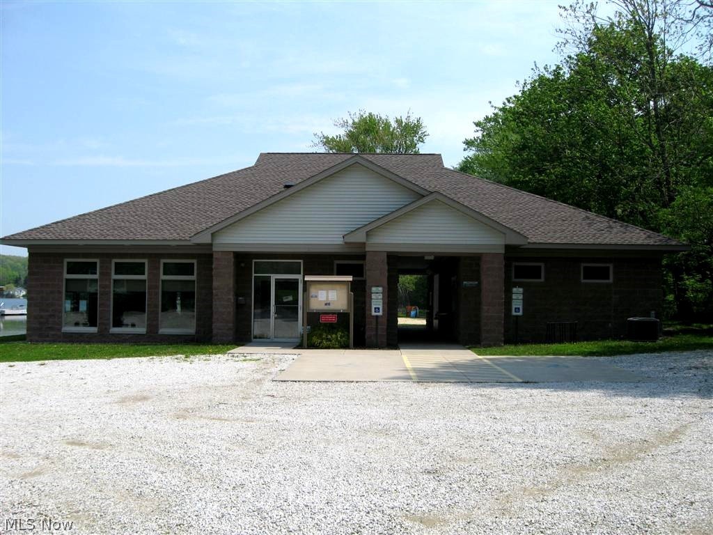 7324 Westview Road Kent, OH 44240 - Photo 27 of 28 This is the entrance to the pavillion that provides access to the beach, playground and picnic area. Thank you for visiting 7324 Westview. Such a treasure and a life style!