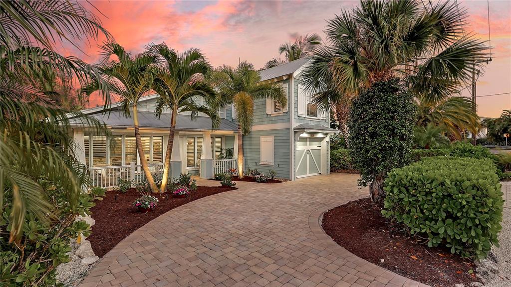 5619 Gulf Drive Holmes Beach, FL 34217 - Photo 1 of 1 a view of a house with a patio