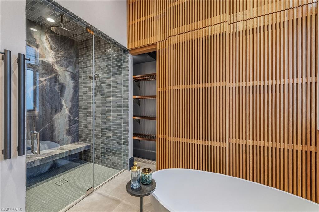 2243 Residence Circle Naples, FL 34105 - Photo 15 of 29 a view of outdoor space with brick wall