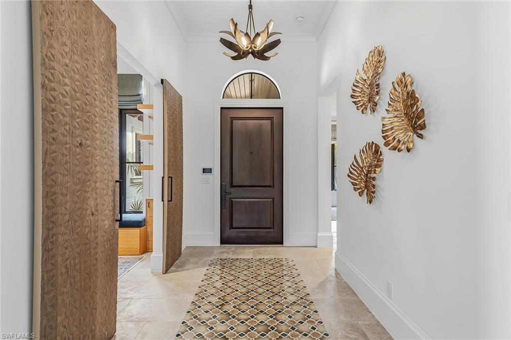 2243 Residence Circle Naples, FL 34105 - Photo 17 of 29 a view of an entryway door