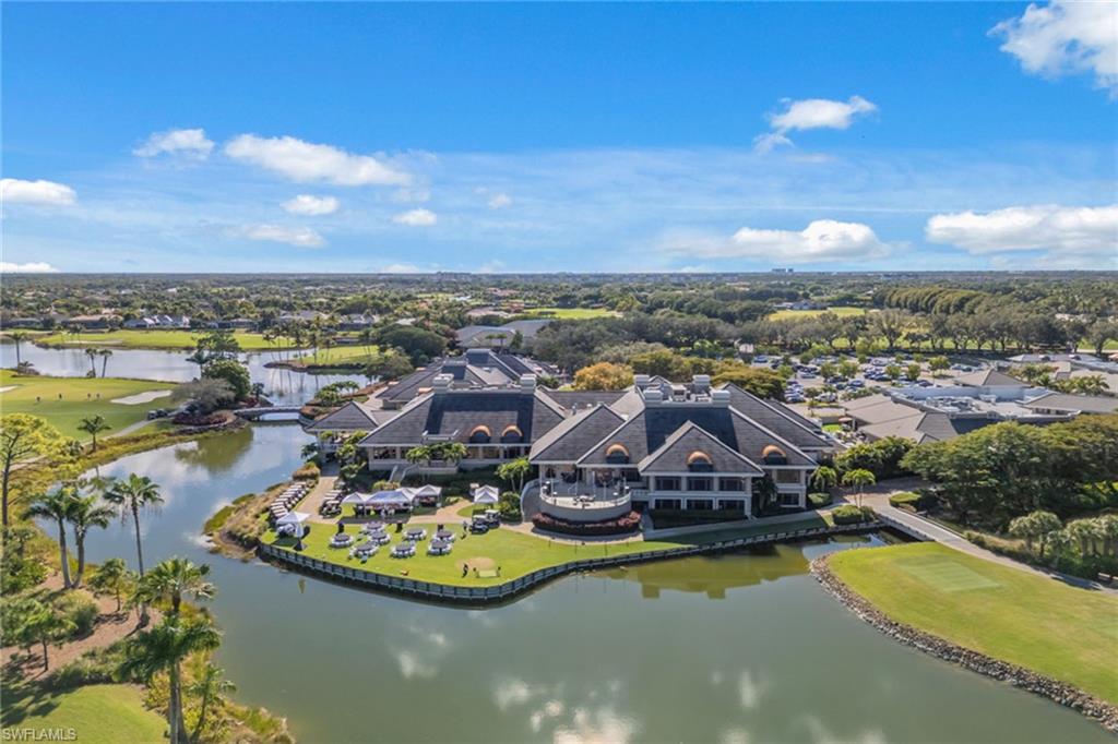 2243 Residence Circle Naples, FL 34105 - Photo 27 of 29 an aerial view of a house with a lake view