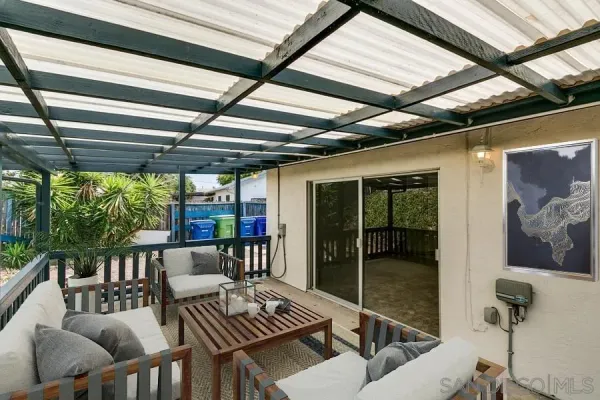 a balcony with furniture