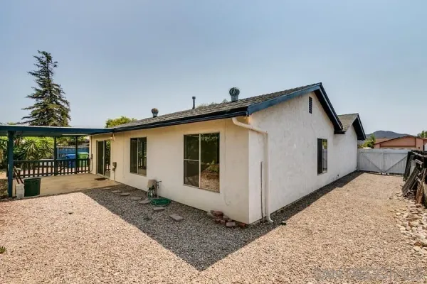 a view of a house with a patio