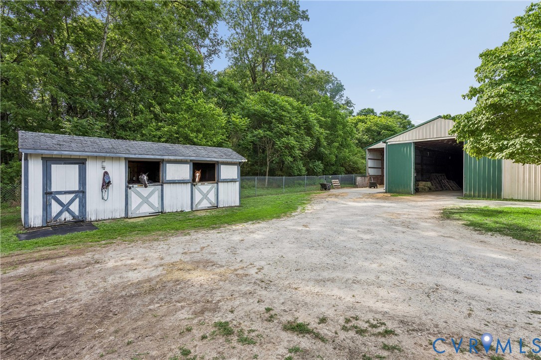 2016 Forge Road Toano, VA 23168 - Photo 9 of 99 Multi-stall stable with a shingled roof and X-pane