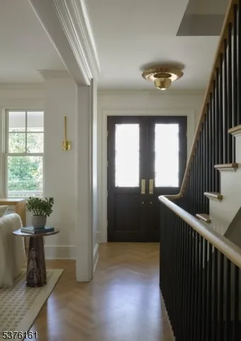 a view of balcony with wooden floor