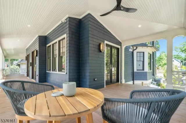 a view of a balcony with furniture