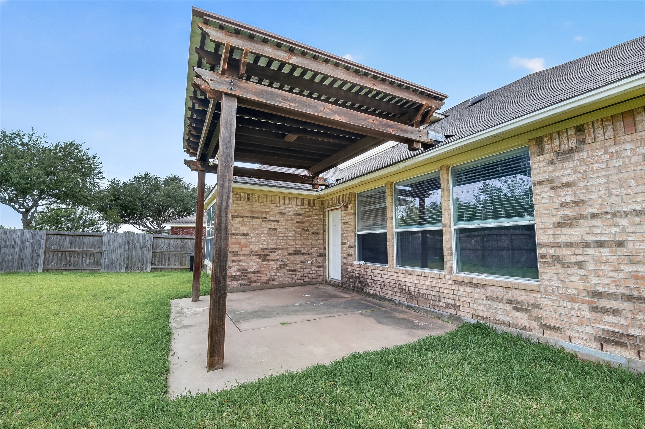 14308 Rocky Briar Lane Rosharon, TX 77583 - Photo 42 of 46 front view of a house with a yard