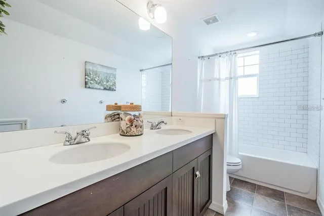 a view of an entrance to house with yard