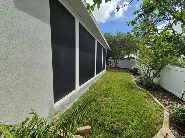a view of a garden with a lake view