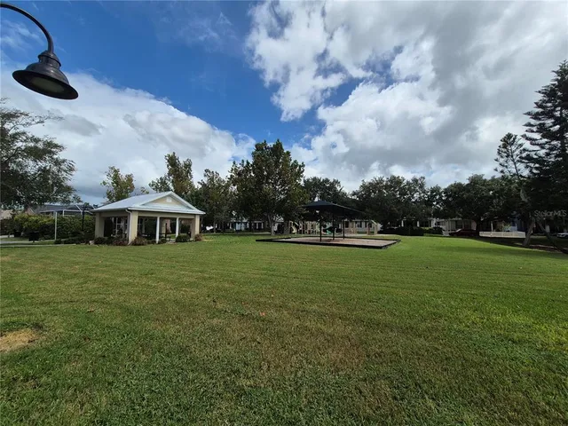 an aerial view of a house with a garden