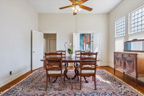 a view of a dining room with furniture