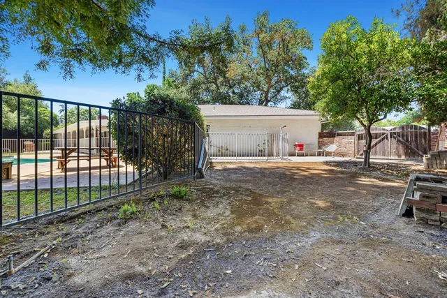 an aerial view of house and yard