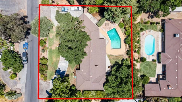 an aerial view of a city and mountain