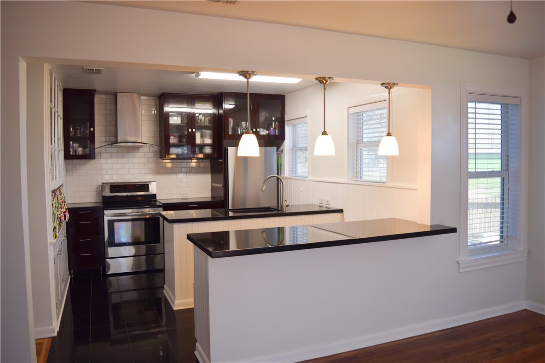 701 Naples Street Corpus Christi, TX 78404 - Photo 5 of 30 kitchen with bar