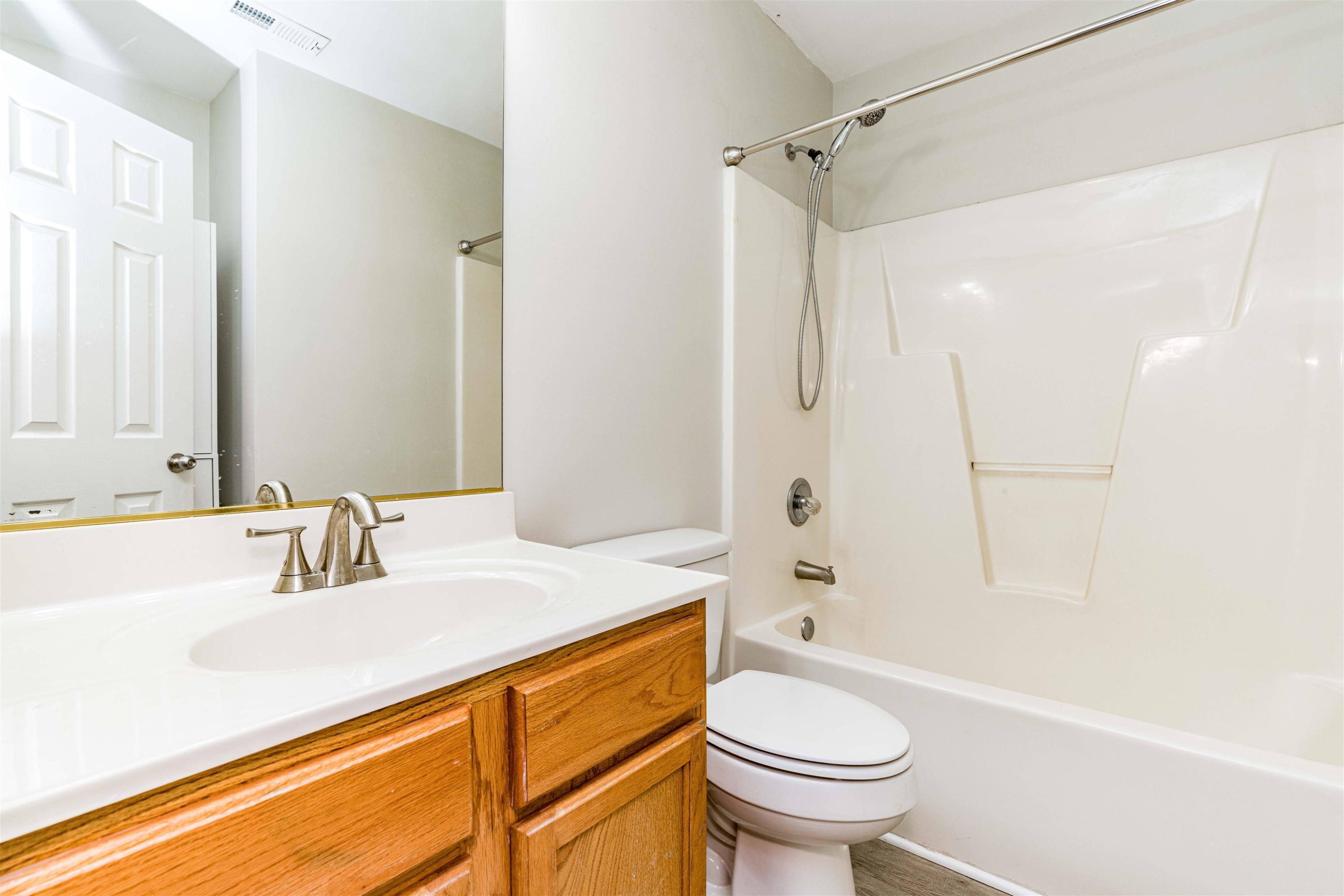 807 Rothshire Court Raleigh, NC 27615 - Photo 22 of 25 a bathroom with a sink a toilet and shower