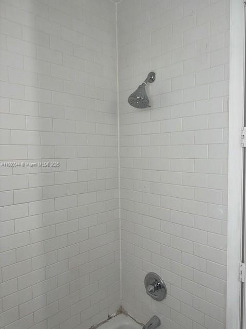 439 15th Street, Unit 9 Miami Beach, FL 33139 - Photo 5 of 11 a bathroom with a shower