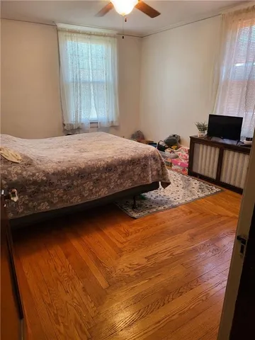 a view of balcony with wooden floor