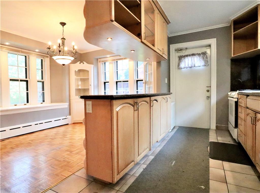 24 Wendover Road Queens, NY 11375 - Photo 11 of 34 a view of a kitchen with a sink and a window