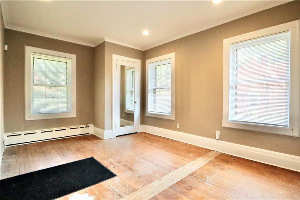 24 Wendover Road Queens, NY 11375 - Photo 19 of 34 a view of an empty room with a window