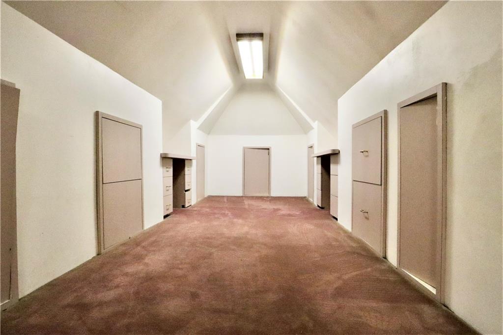 24 Wendover Road Queens, NY 11375 - Photo 21 of 34 a view of a big room with closet and windows