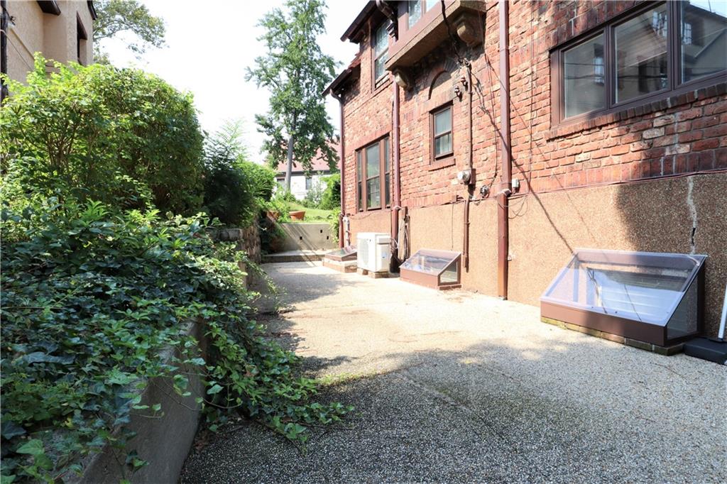 24 Wendover Road Queens, NY 11375 - Photo 27 of 34 a view of a backyard of the house