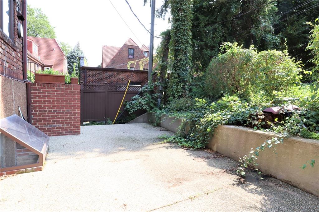 24 Wendover Road Queens, NY 11375 - Photo 28 of 34 a view of bushes and pathway