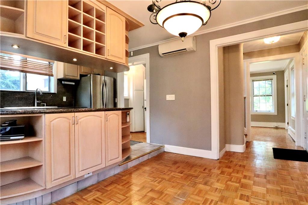 24 Wendover Road Queens, NY 11375 - Photo 8 of 34 a view of a kitchen with a sink and cabinets