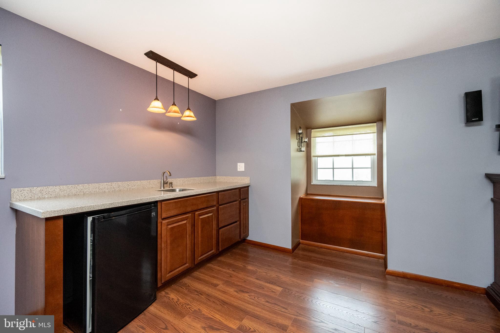 462 Skippers Point Road Oakland, MD 21550 - Photo 54 of 66 a kitchen with granite countertop a sink and a stove top oven