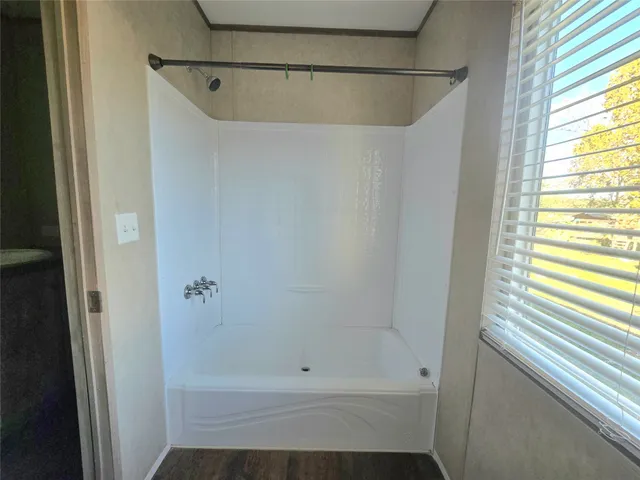 a bathroom with a bathtub