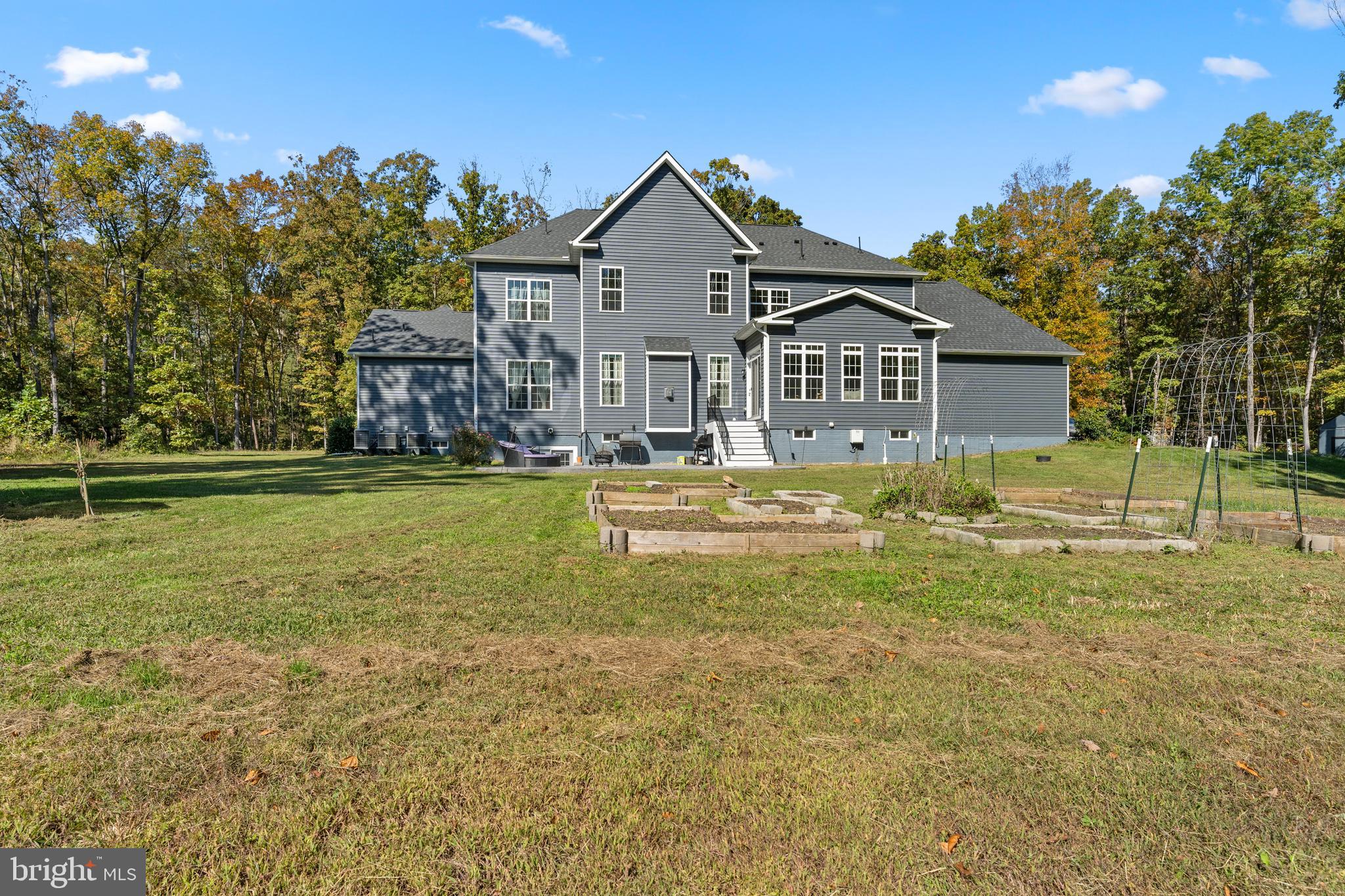 80 Shackelford Well Road Fredericksburg, VA 22406 - Photo 85 of 108 a front view of a house with a yard