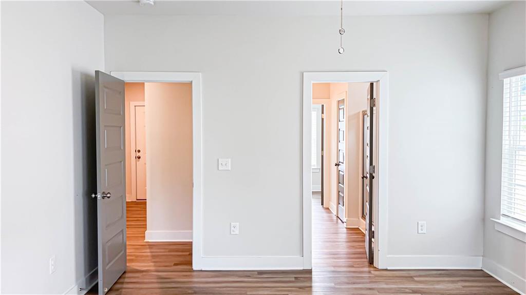 740 Eudora Welty Way Athens, GA 30607 - Photo 25 of 57 a view of a hallway with wooden floor