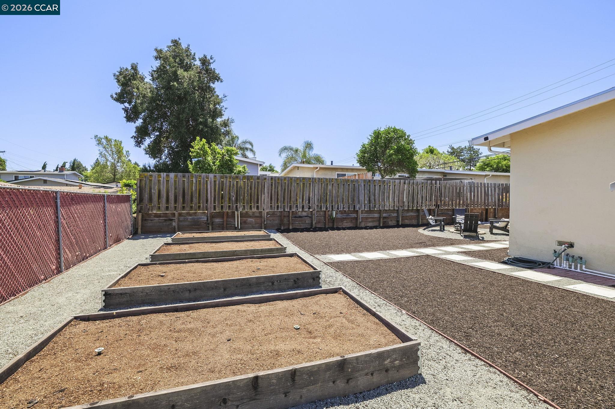 4311 Cowell Road Concord, CA 94521 - Photo 28 of 29 a view of a backyard with wooden fence