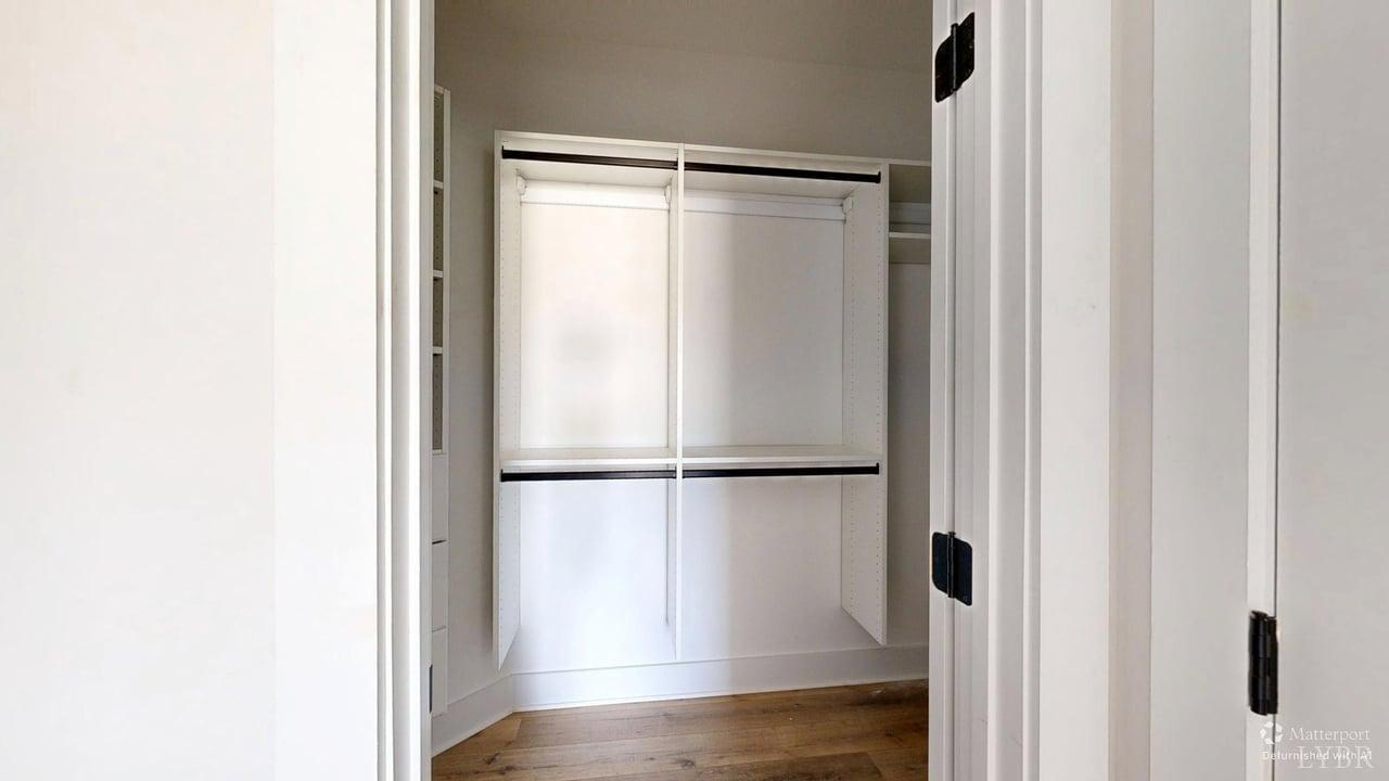 766 Moorman Mill Road Rustburg, VA 24588 - Photo 19 of 42 a view of walk in closet with empty racks