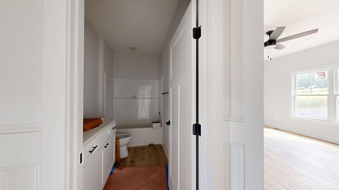 766 Moorman Mill Road Rustburg, VA 24588 - Photo 21 of 42 a bathroom with a bathtub and a shower