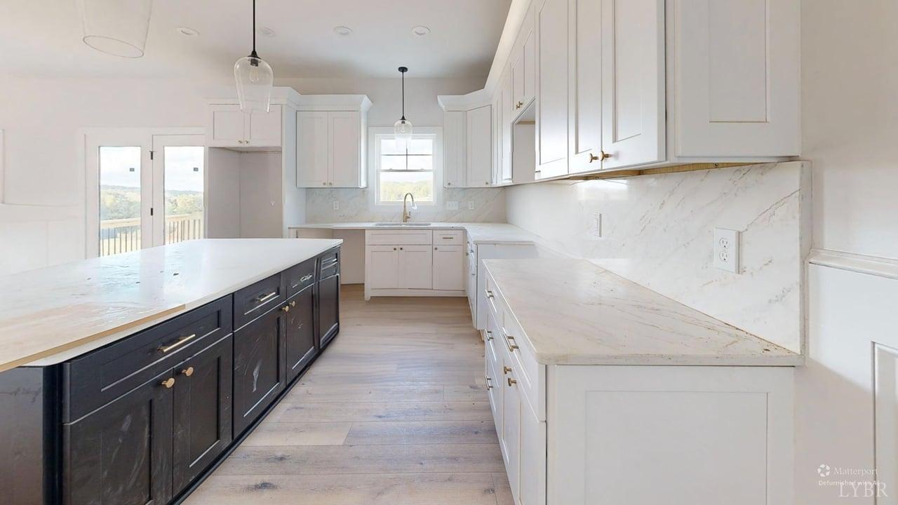 766 Moorman Mill Road Rustburg, VA 24588 - Photo 10 of 42 a kitchen with lot of cabinets and window