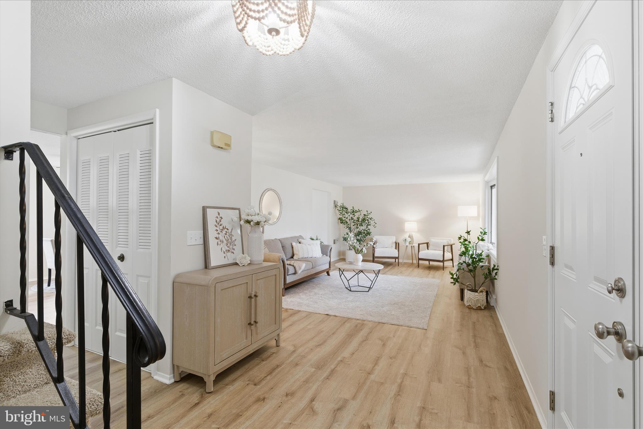 2430 Opal Road York, PA 17408 - Photo 11 of 59 a view of a livingroom with furniture hardwood floor and staircase
