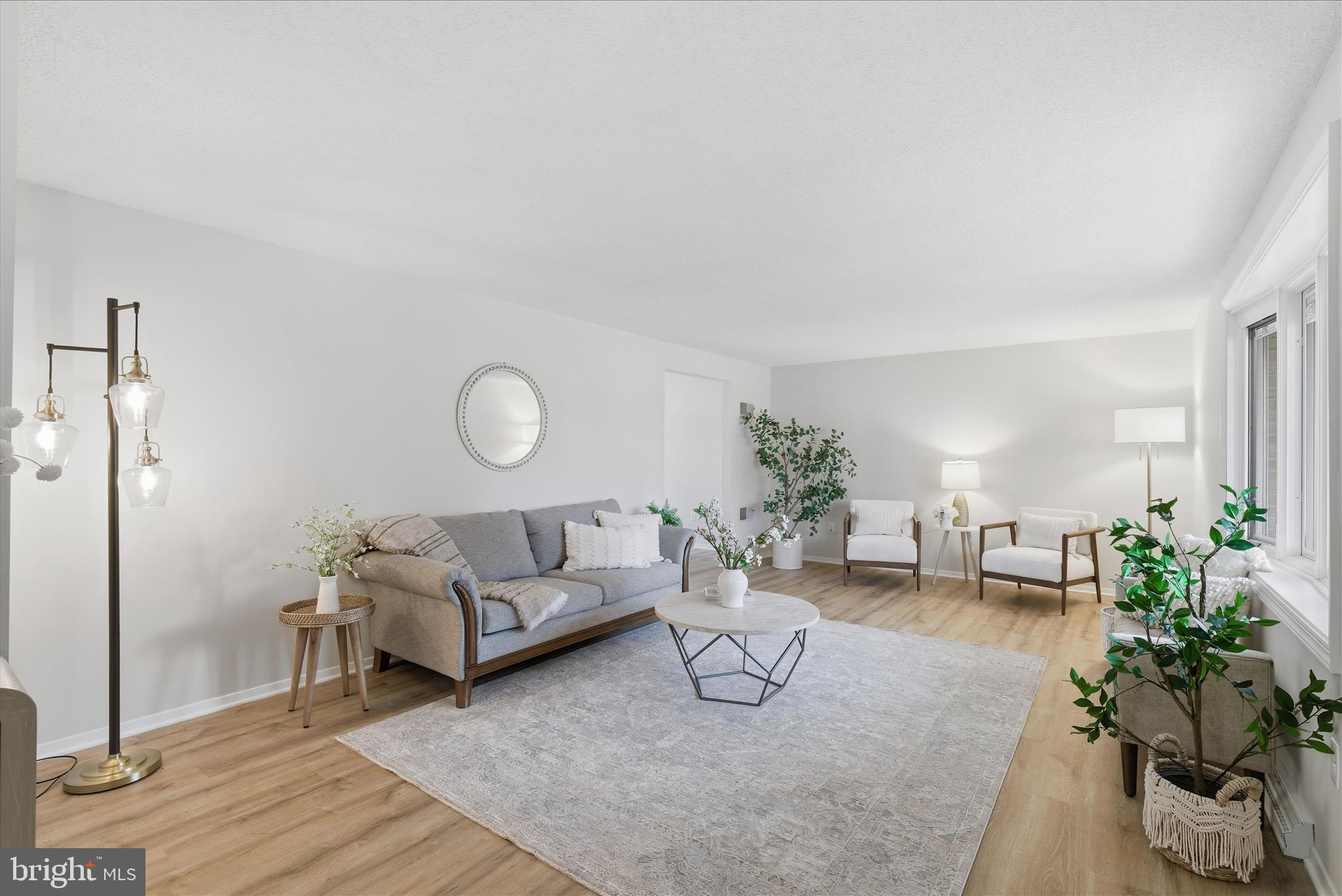 2430 Opal Road York, PA 17408 - Photo 14 of 59 a living room with furniture and a potted plant