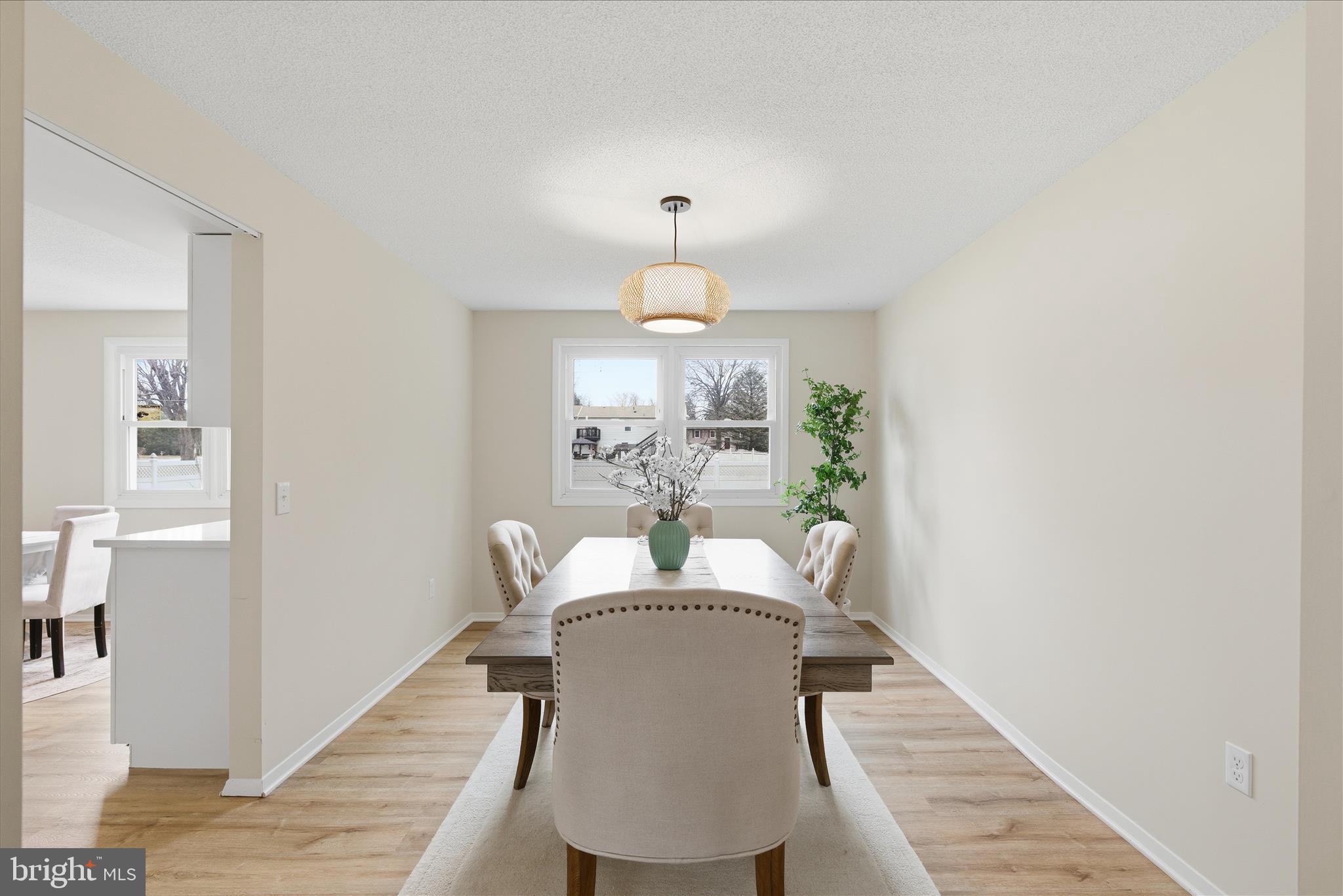 2430 Opal Road York, PA 17408 - Photo 17 of 59 a view of a dining room with furniture and wooden floor