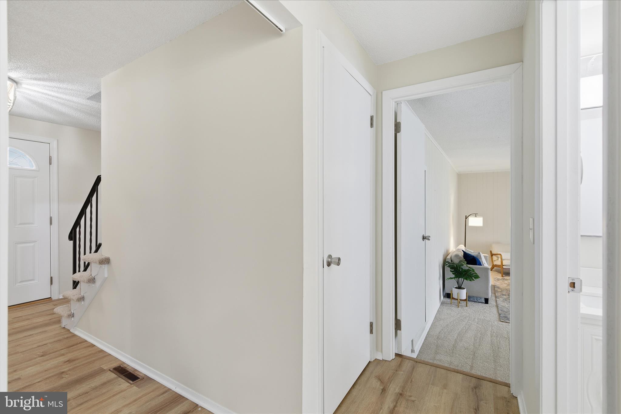 2430 Opal Road York, PA 17408 - Photo 26 of 59 a view of a hallway with wooden floor and closet