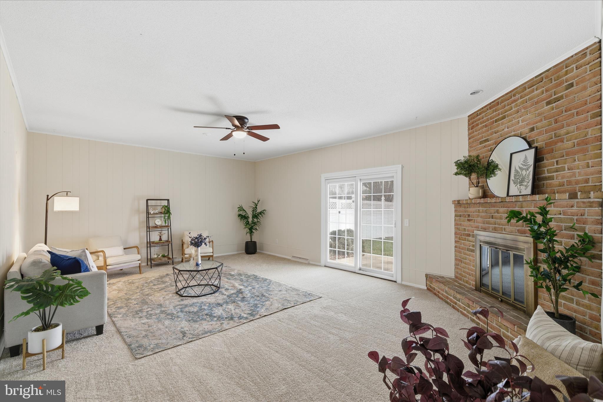 2430 Opal Road York, PA 17408 - Photo 28 of 59 a living room with furniture a fireplace and a flat screen tv