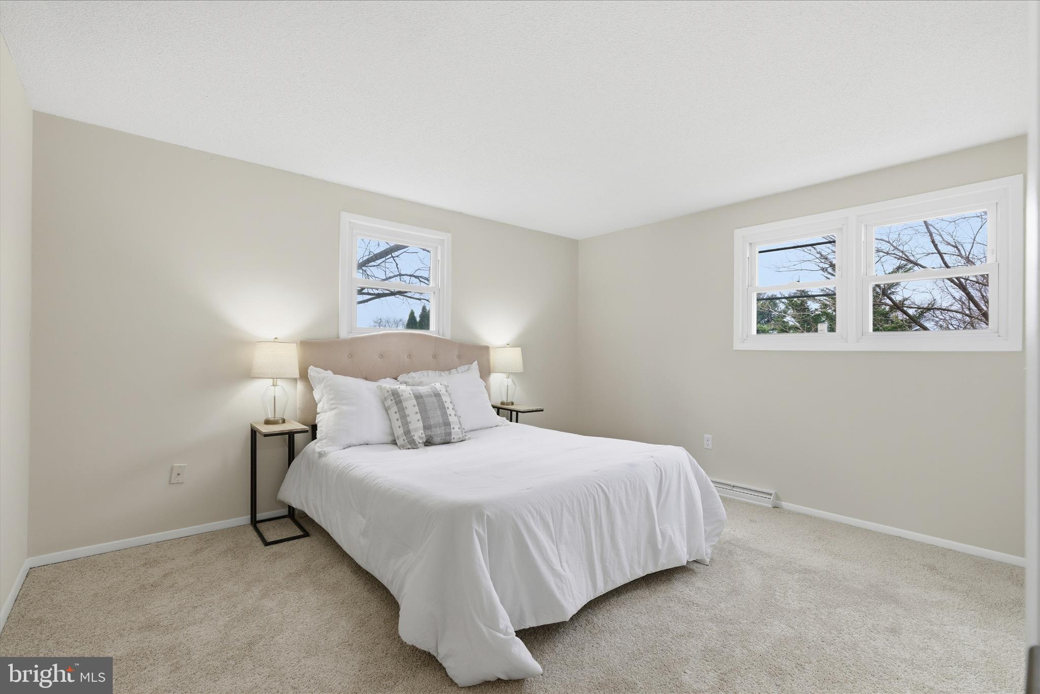 2430 Opal Road York, PA 17408 - Photo 37 of 59 a bedroom with a bed and a painting on the wall