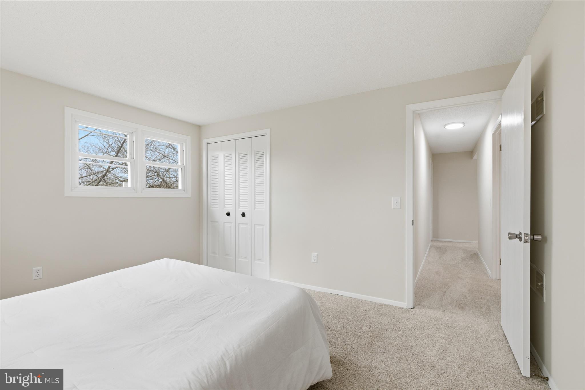 2430 Opal Road York, PA 17408 - Photo 38 of 59 a bedroom with a bed and a painting on the wall