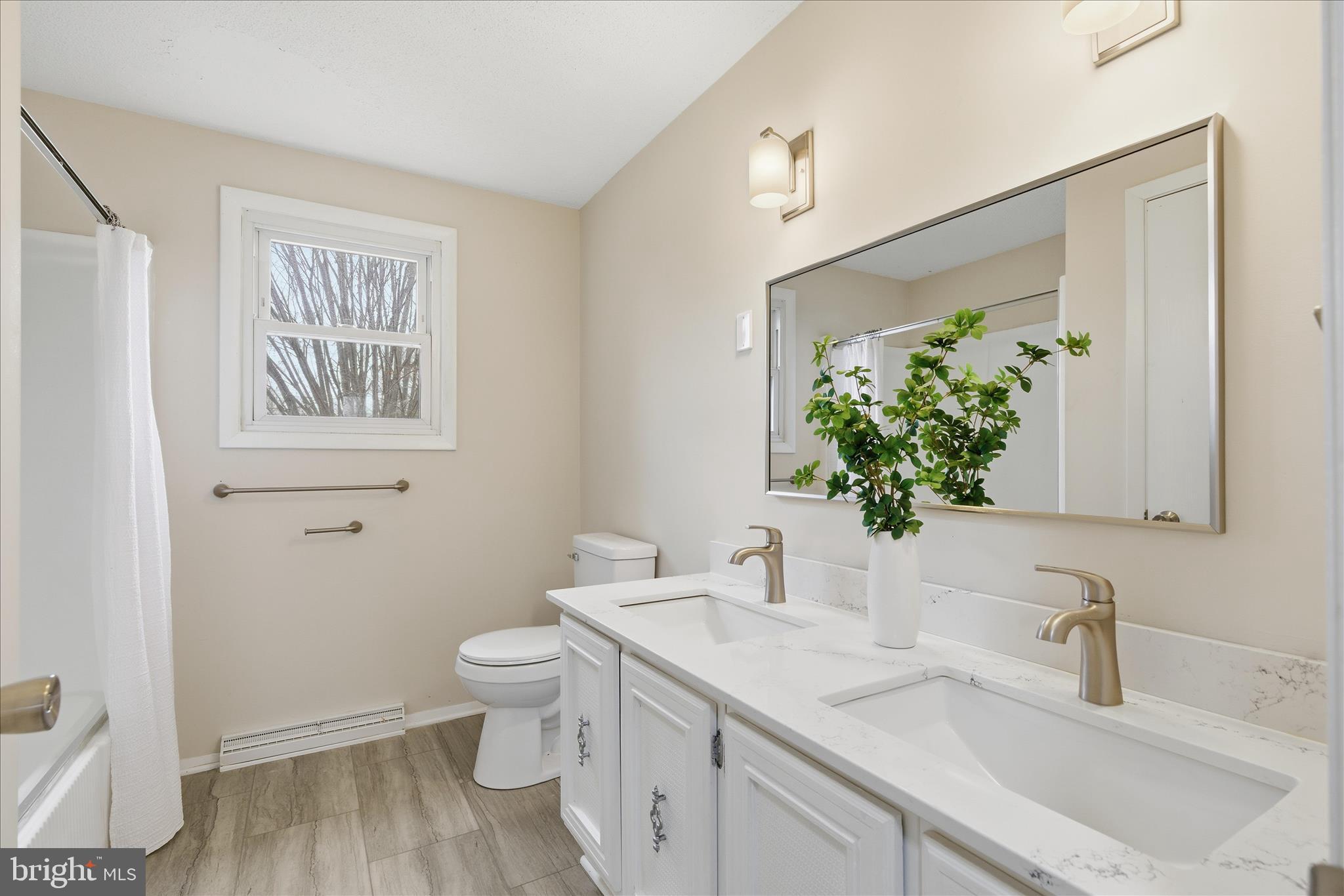 2430 Opal Road York, PA 17408 - Photo 42 of 59 a bathroom with a granite countertop sink and a large mirror