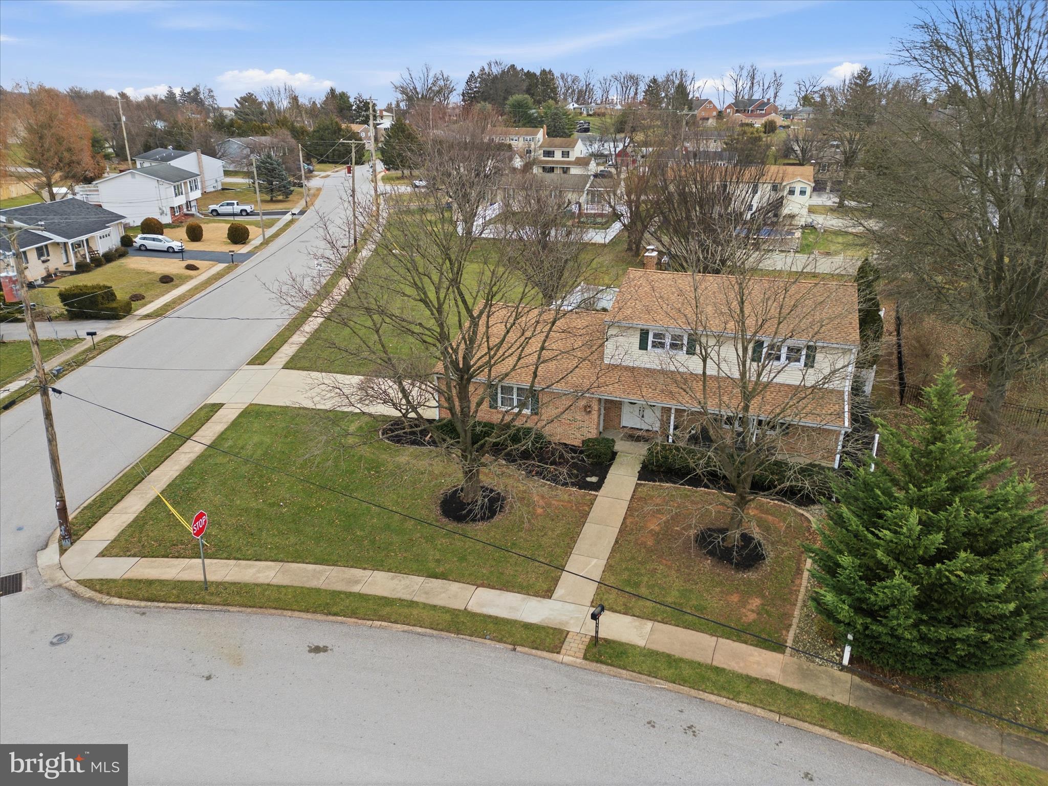2430 Opal Road York, PA 17408 - Photo 9 of 59 an aerial view of a house with a garden and trees