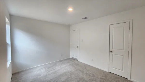 a bathroom with a sink toilet and vanity