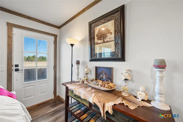 a kitchen that has a lot of cabinets a sink and a stove