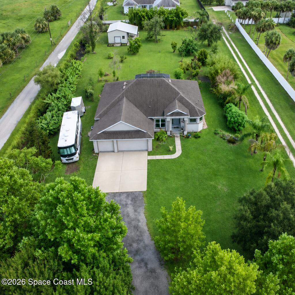 1475 Dalbora Road Merritt Island, FL 32953 - Photo 1 of 57 an aerial view of a house