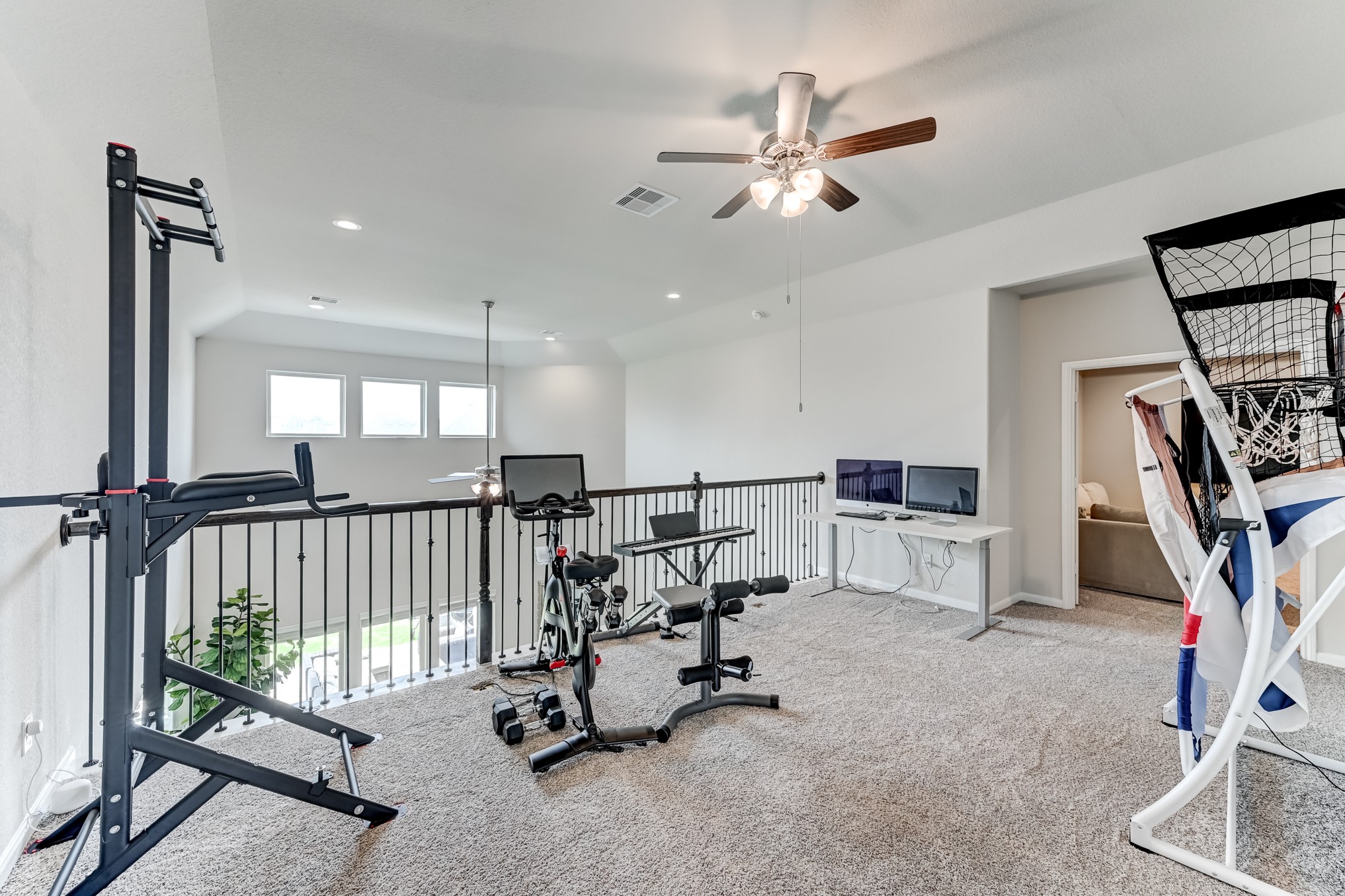 5806 Metaphor Way Rosenberg, TX 77469 - Photo 39 of 50 a view of a room with gym equipment