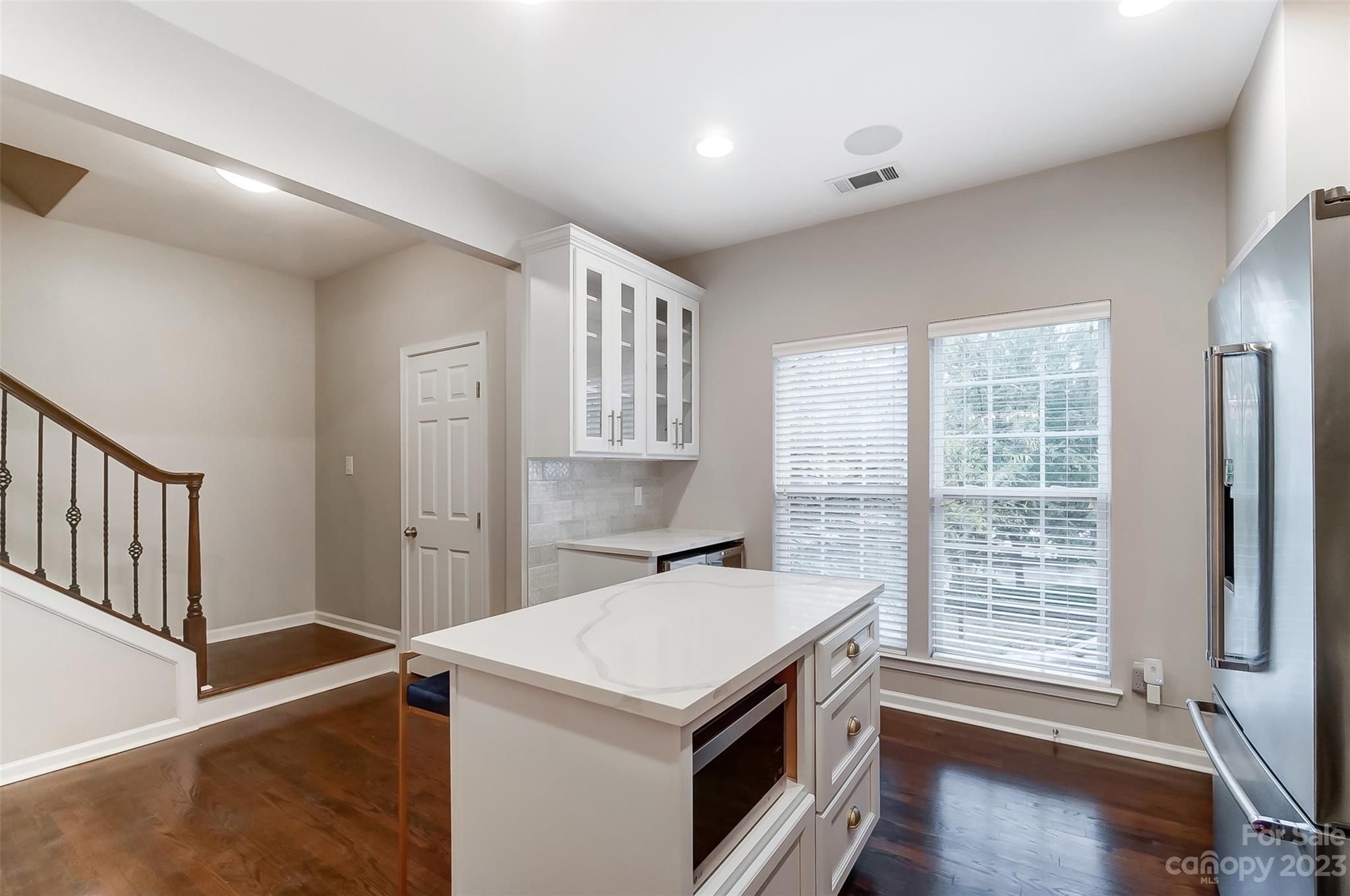 231 Lincoln Street Charlotte, NC 28203 - Photo 11 of 48 a kitchen that has a sink and a stove