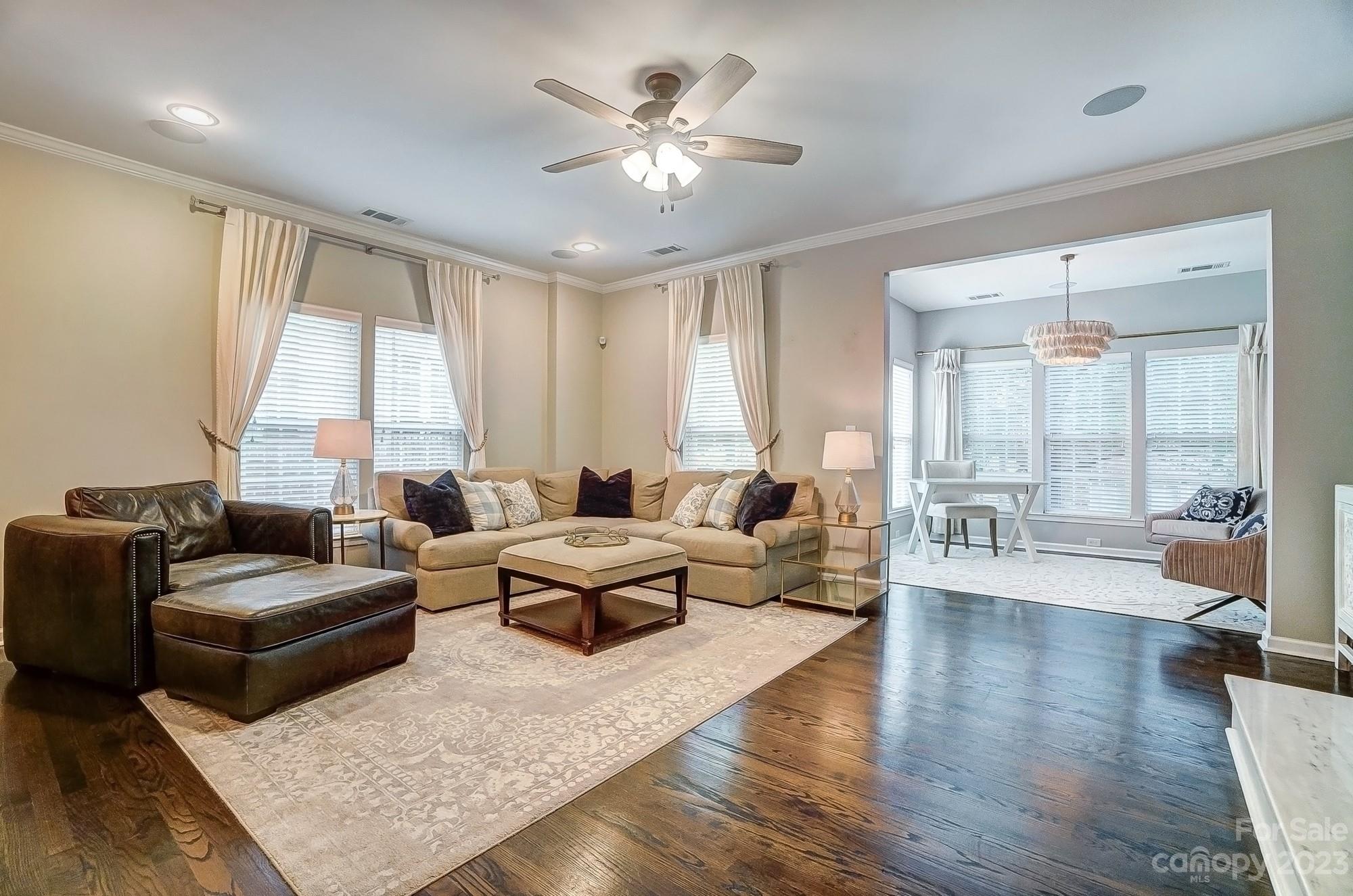 231 Lincoln Street Charlotte, NC 28203 - Photo 13 of 48 a living room with furniture and a large window